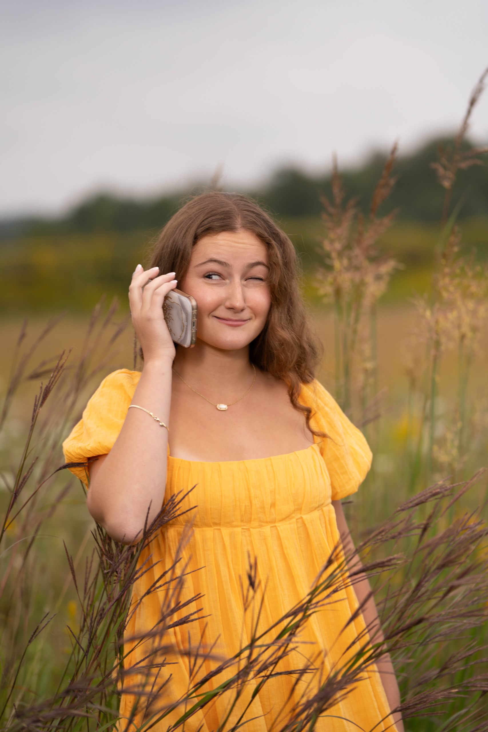 High School Senior Photography in Liberty park with Cell phone.